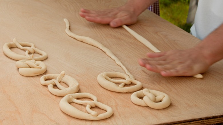 Rolling and shaping pretzel dough