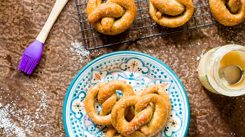 Baked pretzels with pastry brush