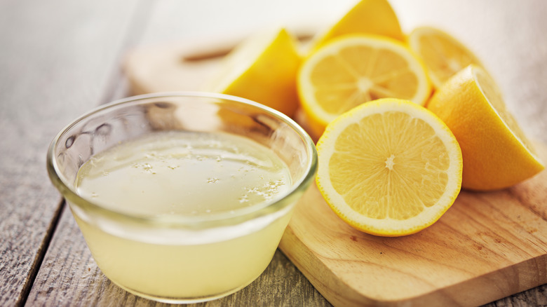 Freshly squeezed lemon juice in bowl