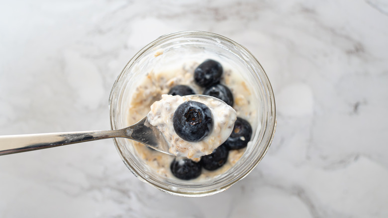 Overnight oats on spoon