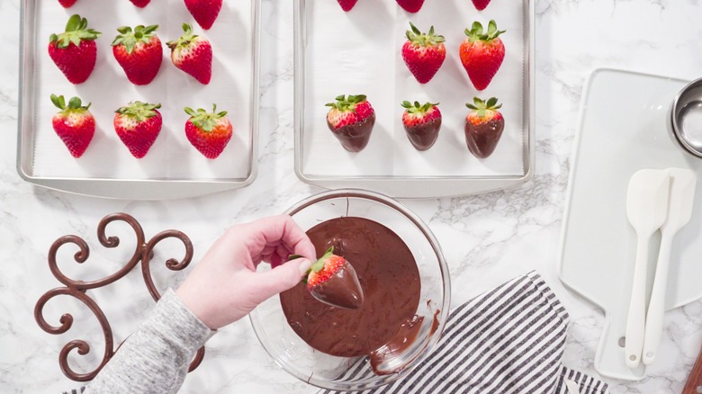 Making chocolate-dipped strawberries