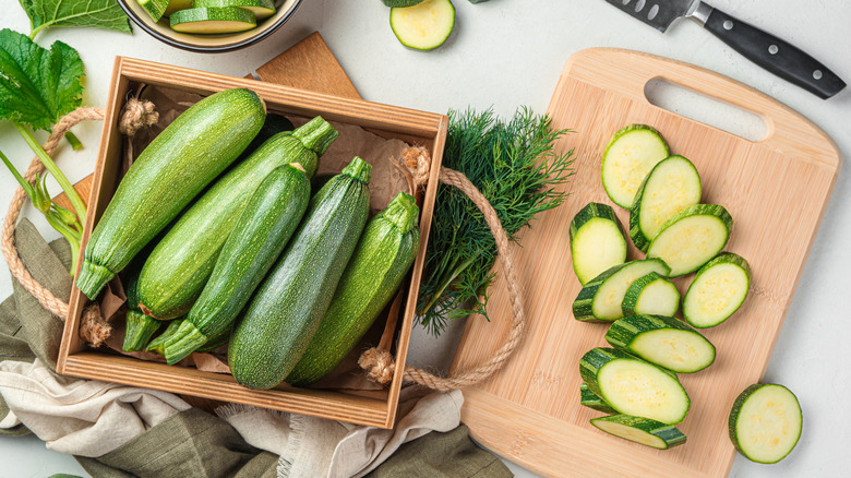 sliced zucchini on cutting board