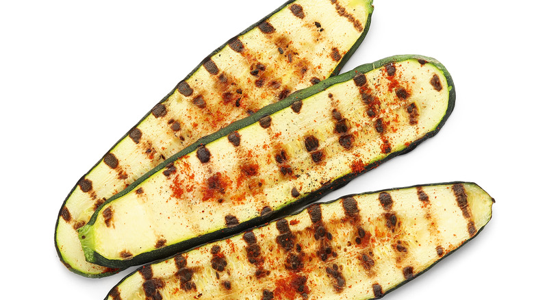 three pieces of grilled squash