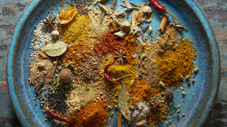 spices on a blue plate