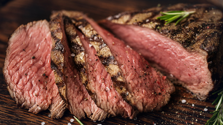 Medium-rare ribeye steak sliced into strips