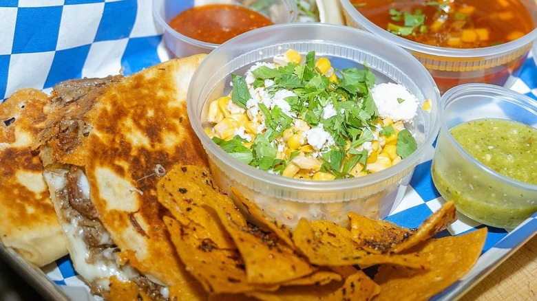 Chips, salsa, and quesadilla plated