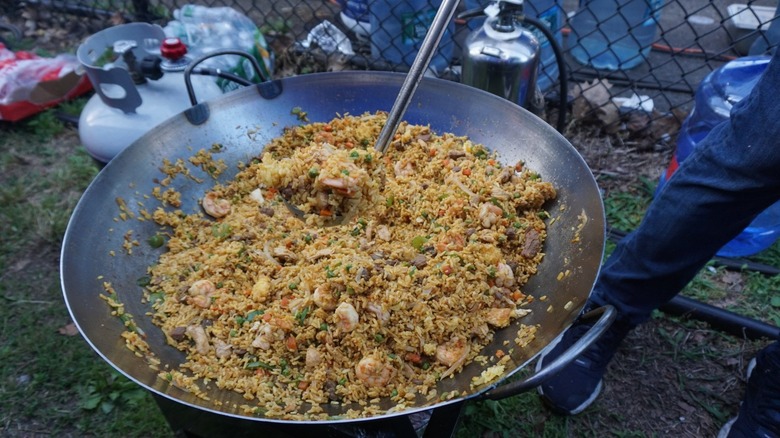 Large wok with fried rice