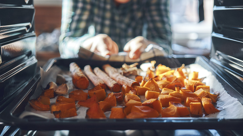 pumpkin being roasted on sheet