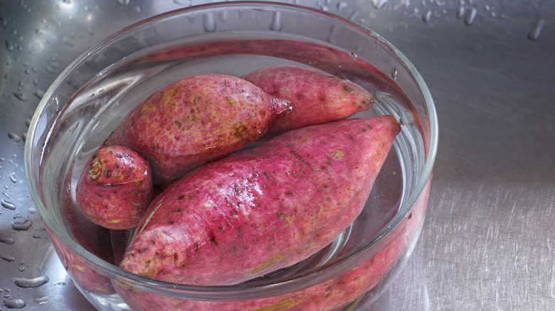 sweet potatoes soaking in water