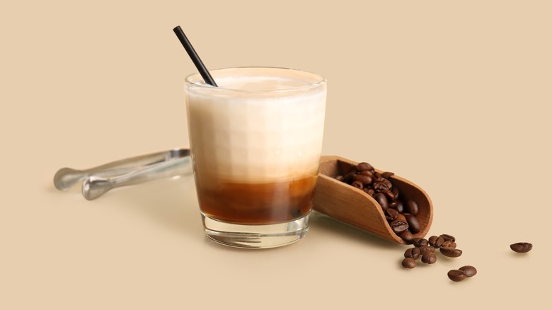 White Russian cocktail and coffee beans