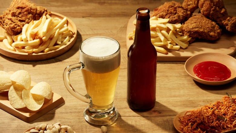 Bottled beer and fried snacks