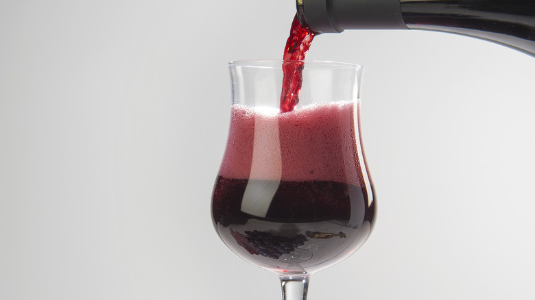 Lambrusco being poured into glass