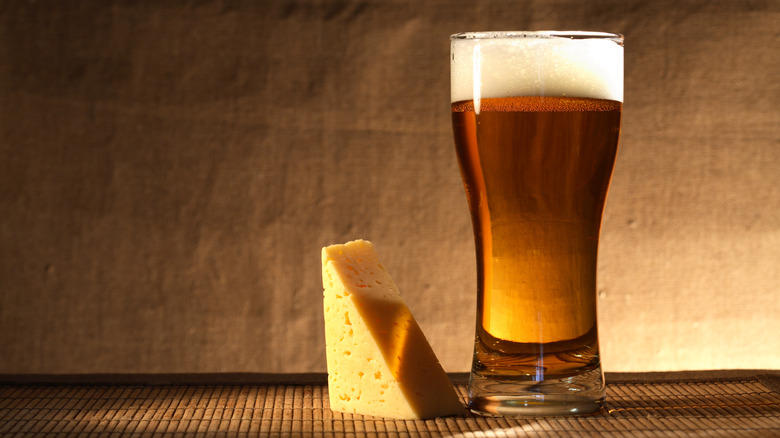 Glass of beer and cheese