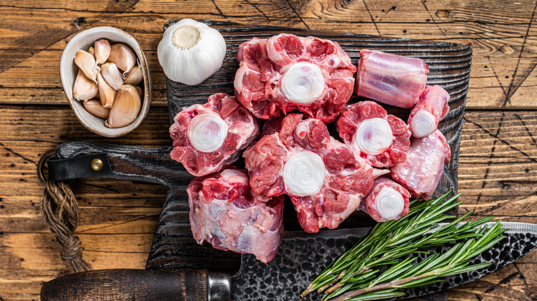 raw oxtail on cutting board