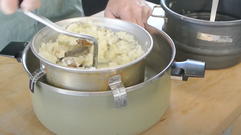 food mill processing potatoes