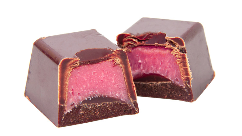 Chocolates with pink raspberry cream