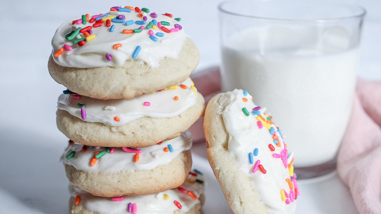 Decorated sugar cookies and milk