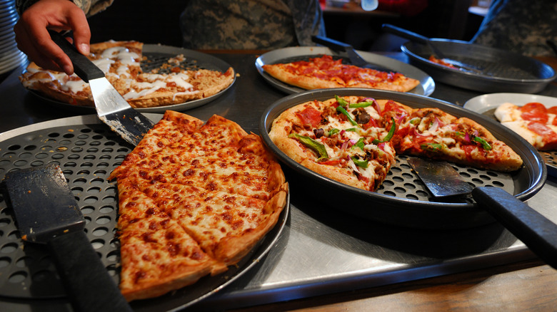 Pizzas at a buffet