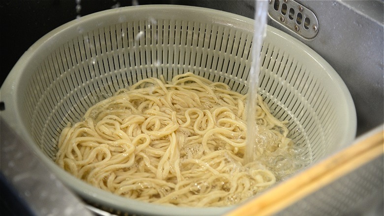 white bowl of wheat noodles