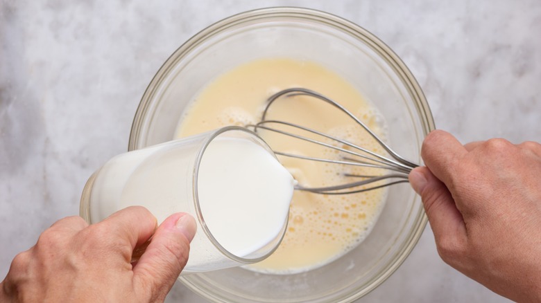 Eggs and milk being whisked