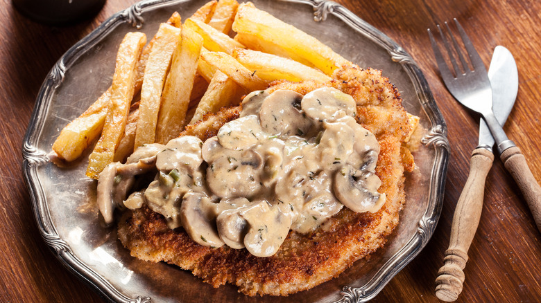 Fried pork cutlet with mushroom gravy