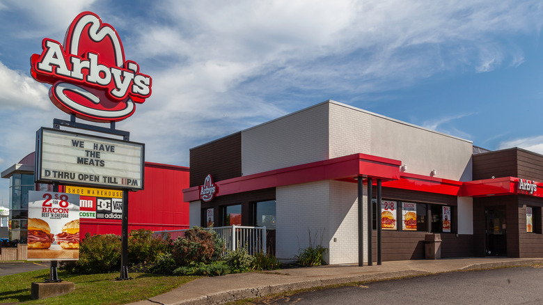 arby's sign by restaurant