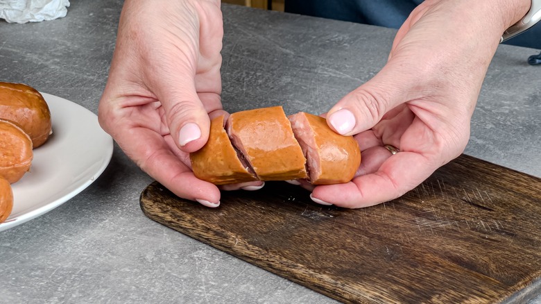 spiral cut sausage in hands
