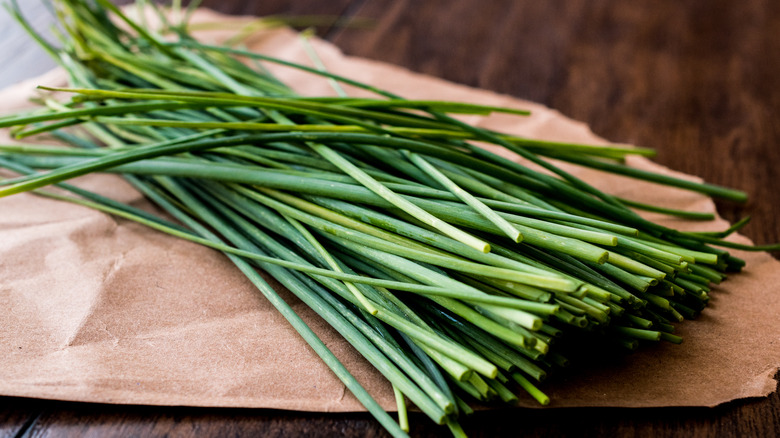 fresh chives on table