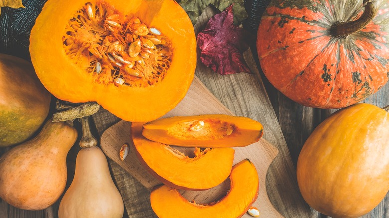 whole and halved pumpkins