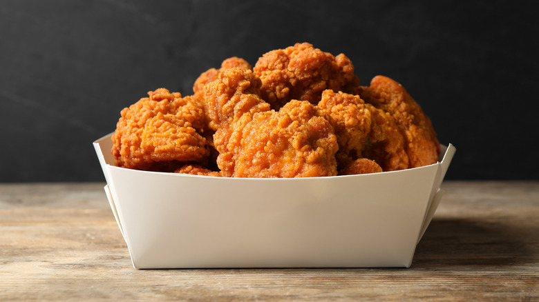 fried chicken in cardboard container