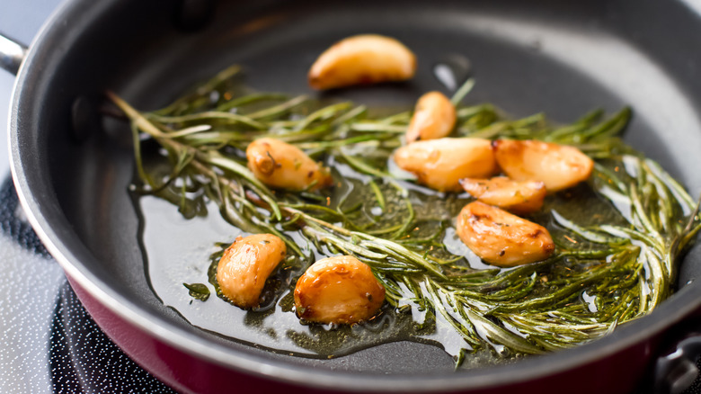 pan with fried rosemary and garlic