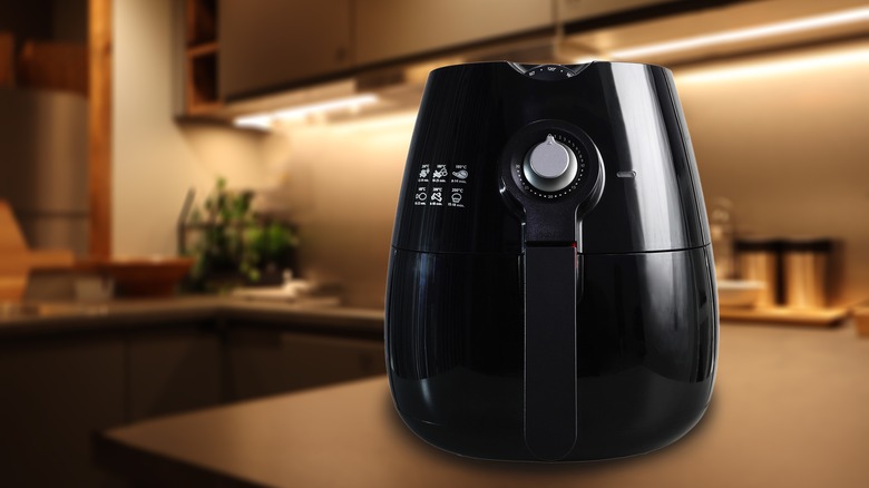 black air fryer on counter