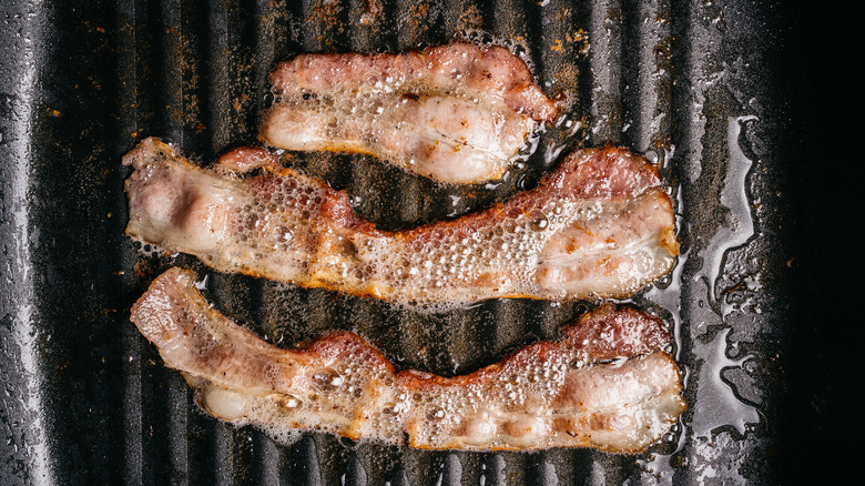 bacon cooking in pan