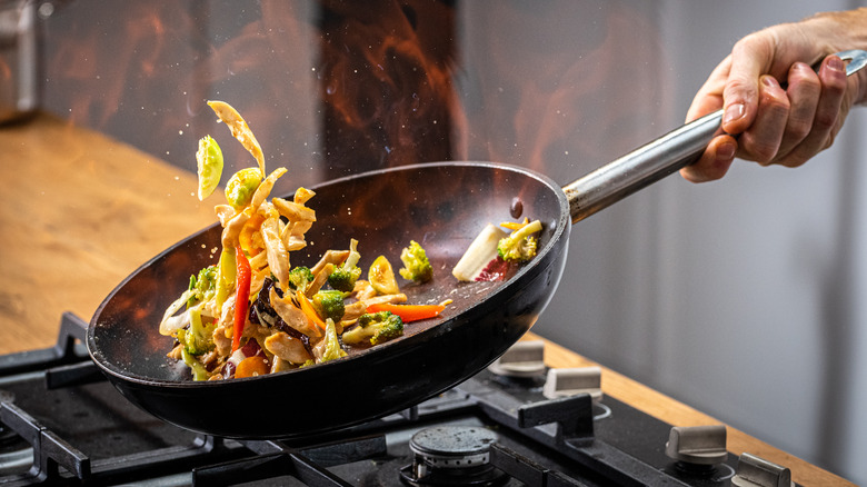 chef cooking stir-fry