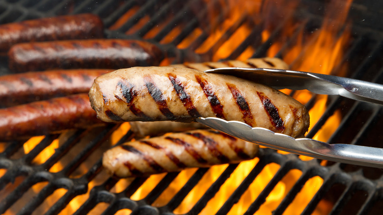 bratwurst on a flaming grill