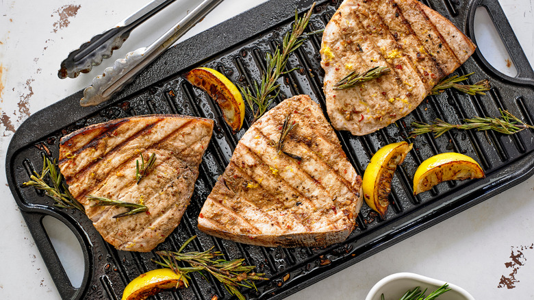 swordfish steaks on griddle