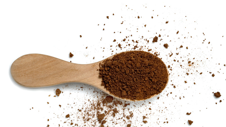 Wooden spoon of espresso powder