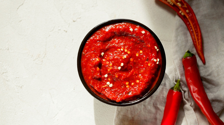 chilies and bowl of chili paste