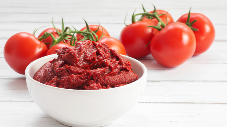 tomatoes and bowl of tomato paste