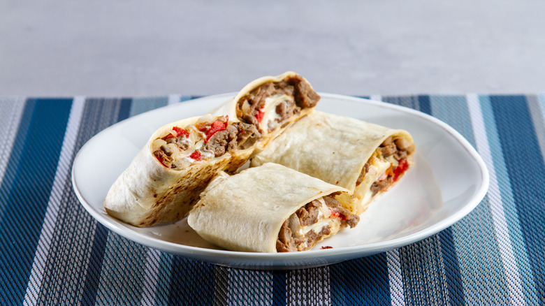 Plate of sliced burritos