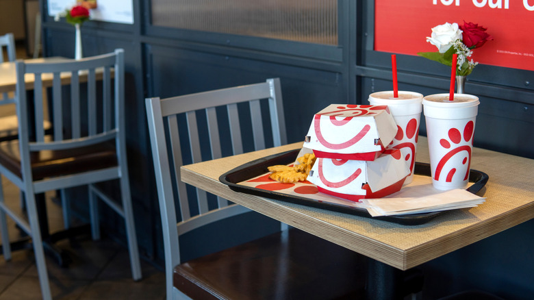 Chick-fil-A food on tray, sitting on table in Chick-fil-A restaurant