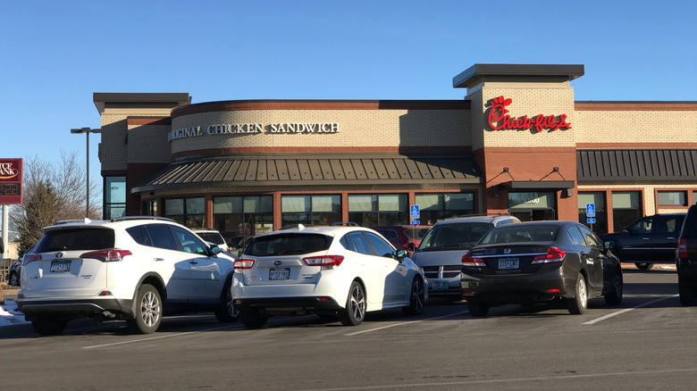 Cars parked in front of Chick-fil-A