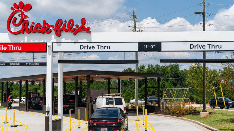 Chick-fil-A drive thru, with several cars waiting in the queue