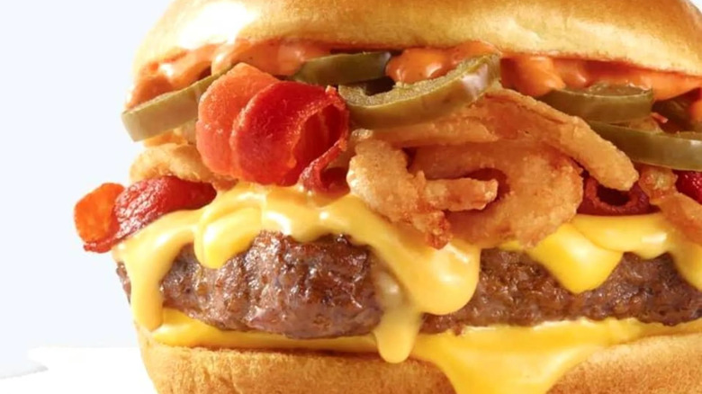 wendy's jalapeño cheeseburger on white background