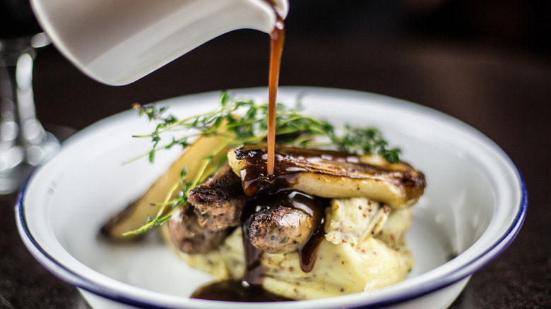 sauce poured over sausage dish