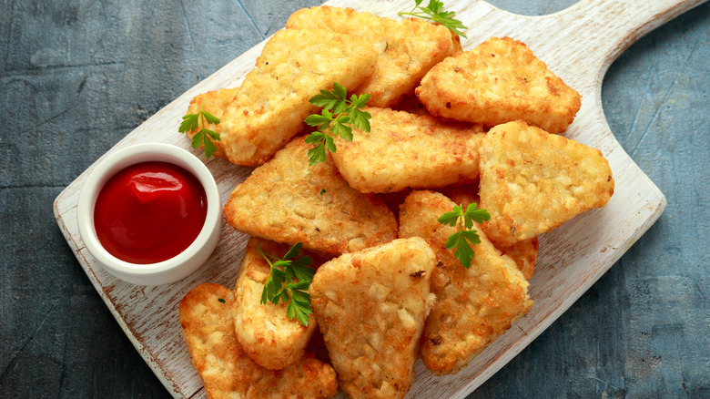 hashbrowns with ketchup on board