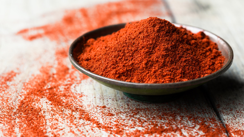ground paprika spice in bowl