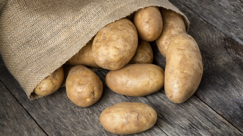 russet potatoes in brown bag