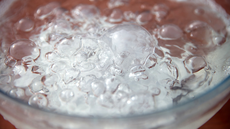 ice cubes in bowl of water