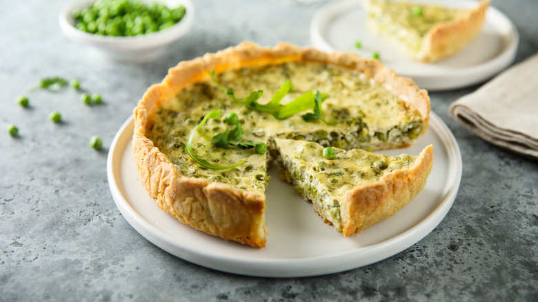 Quiche with fresh arugula